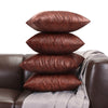 plusieurs coussin Coussin Simili Cuir Marron sur un canapé